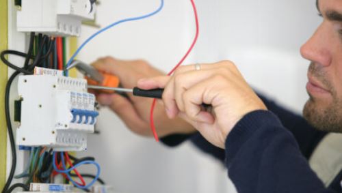 Trainee and apprentice electricians at work